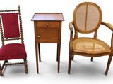 three pieces of furniture including a chair, table, and side table