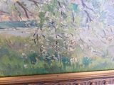 a painting on the wall of a room with a painting on the wall