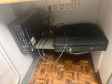 a microwave and a microwave oven in the corner of a room
