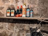 many bottles of beer on the shelves in the room