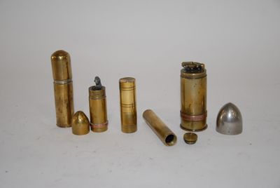 several different types of bullet shells on a white surface