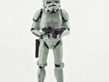 a toy of a stormtrooper standing on a white surface