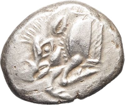 a close up of a silver coin with a horse on it