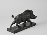 a bronze statue of a boar on a marble base