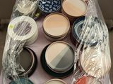a table that has many different types of paint on it