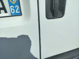 a shadow of a person on the door of a truck