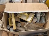 a cardboard box full of items sitting on a pallet