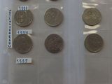 a lot of coins that are in a plastic bag