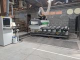 an image of a machine that is working on a piece of equipment