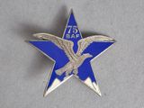 a close up of a blue star with an eagle on it