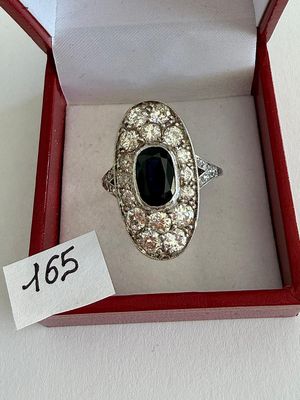 Bague Marquise 2 ors rhodiée, sertie d'un Saphir bleu nuit d…
