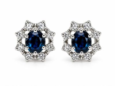 a pair of sapphire and diamond stud earrings