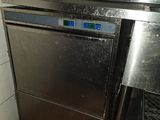 an image of a kitchen with a stove and a dishwasher