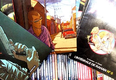 a lot of comic books on the table