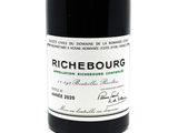 a bottle of wine that is sitting on a table