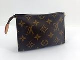 une photo d'un sac à main Louis Vuitton marron