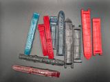 a lot of different types of watch bands on a table