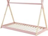 the wooden bed frame is pink and white with a ladder