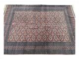 un tapis dont le dessous est orné d'un motif