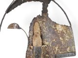 an old rusty iron ironing iron with a handle