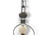 a wall mounted light that is hanging on the wall