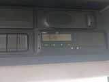 a radio in the center of a car ' s dashboard
