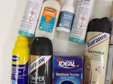 many different types of glues and paint on the counter