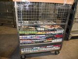 a metal cart with many items on it in a warehouse