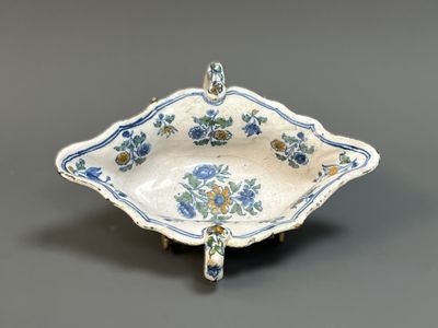 an image of a blue and white bowl with flowers on it