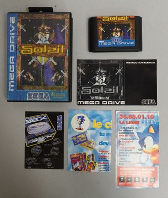 de nombreux jeux vidéo différents accrochés les uns à côté des autres sur le mur