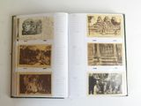 an open book with pictures of people and animals on it