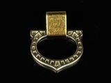 a close up of a metal ring with a gold ring on it