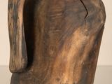 a wooden vase that is sitting on a table