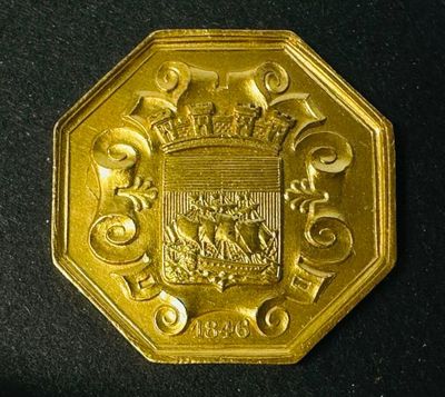 an image of a gold coin with a coat of arms on it