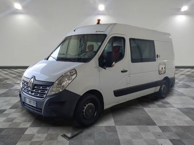 a white van that is parked in a room