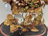 a vase that has a bunch of flowers in it