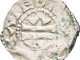 Gros plan sur une pièce d'argent ornée d'une couronne