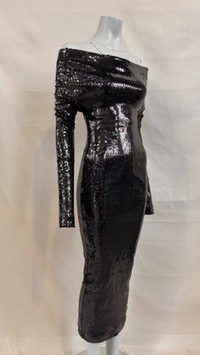 a black sequinized dress on a mannequin mannequin mannequin mannequin mannequin mannequin mannequin mannequin