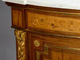 a marble top on a wooden cabinet with a marble top