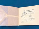 an open book with a drawing of a woman holding a tennis racquet