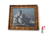 painting of a church in a gold frame on a white wall