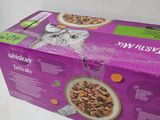 a box of cat food that is sitting on a table