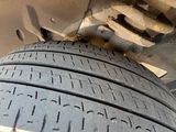a close up view of a tire on a vehicle