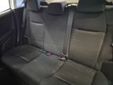 the back seats of a car with no one in it