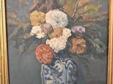 a painting of flowers in a vase on a table