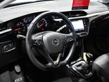 a steering wheel and dashboard of a car on display
