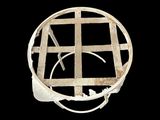 a metal sculpture of a cage on a black background