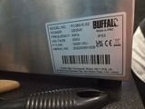 a label on the side of a machine that is on the counter