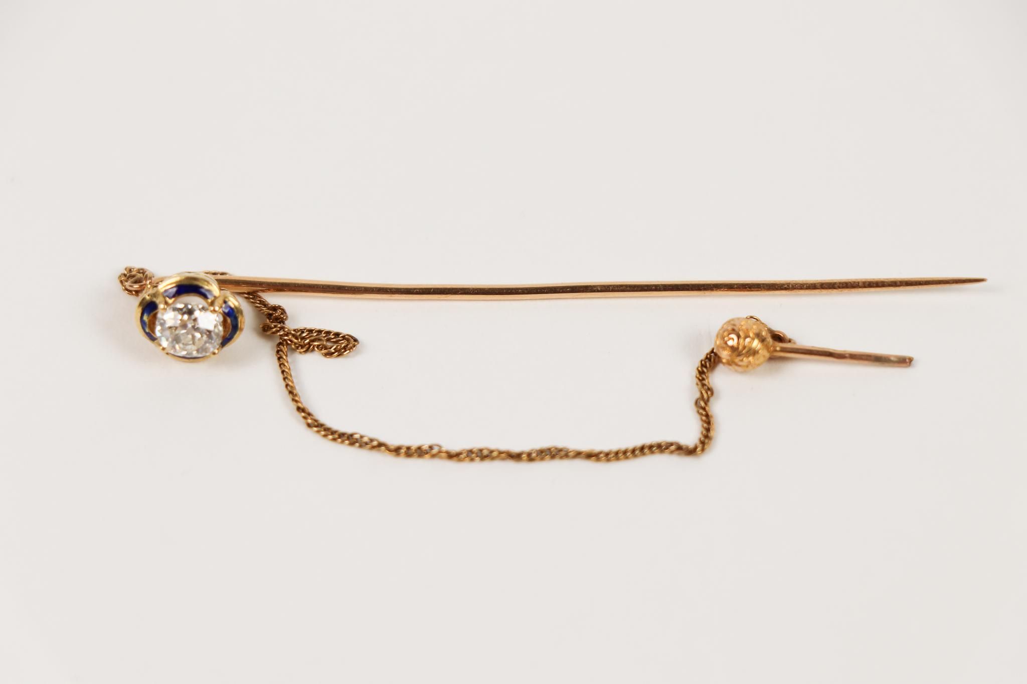 Epingle à cravate en or jaune 18K (750) ornée d'un diamant c…