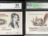 trois types différents de billets de banque exposés dans une vitrine